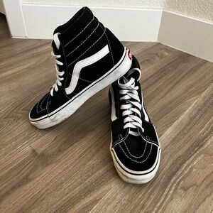 Vans Black and White Skate Sneakers with Iconic Stripe